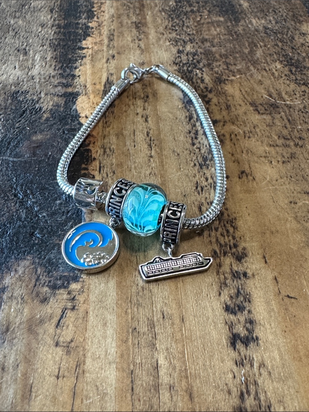 Princess cruises Silver-Tone Blue Glass Charm Bracelet with Cruise & Wave Charms